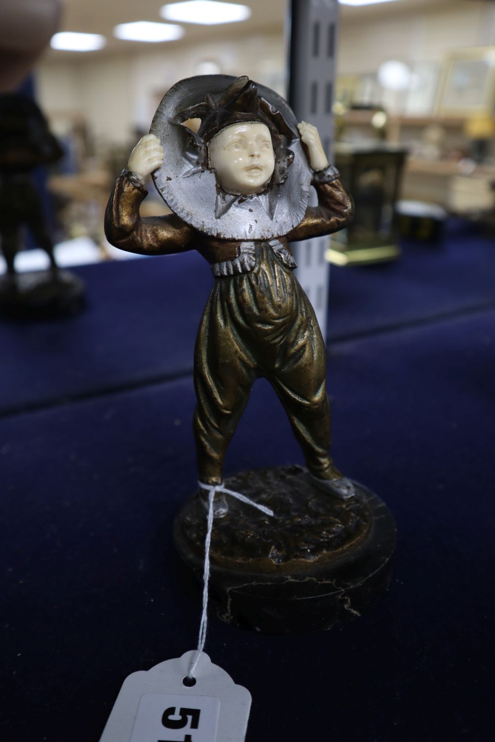 Georges Gomerth. An Art Deco ivory and cold painted bronze figure of a boy, signed, height 17cm